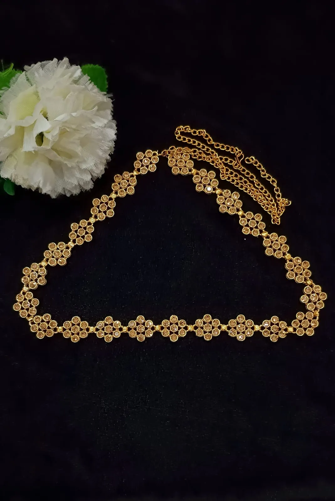 Alluring Gold Color Antique Gold Floral Design Stone Worked Hip Chain