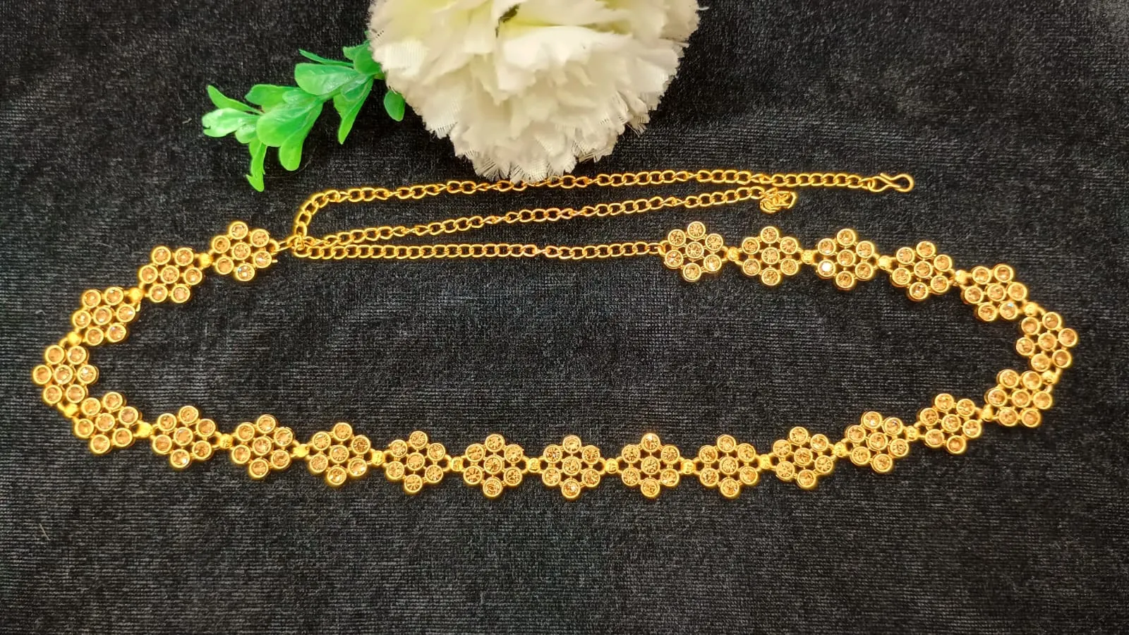 Alluring Gold Color Antique Gold Floral Design Stone Worked Hip Chain