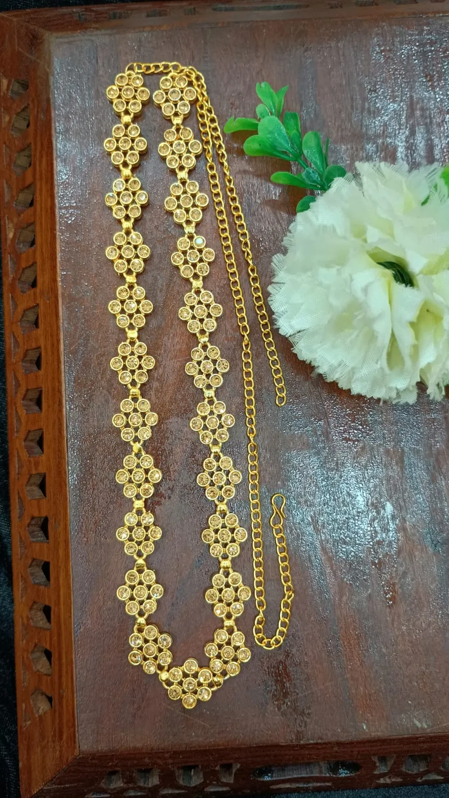 Alluring Gold Color Antique Gold Floral Design Stone Worked Hip Chain
